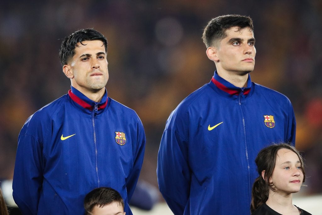 Joao Cancelo and Gerard Martin of FC Barcelona