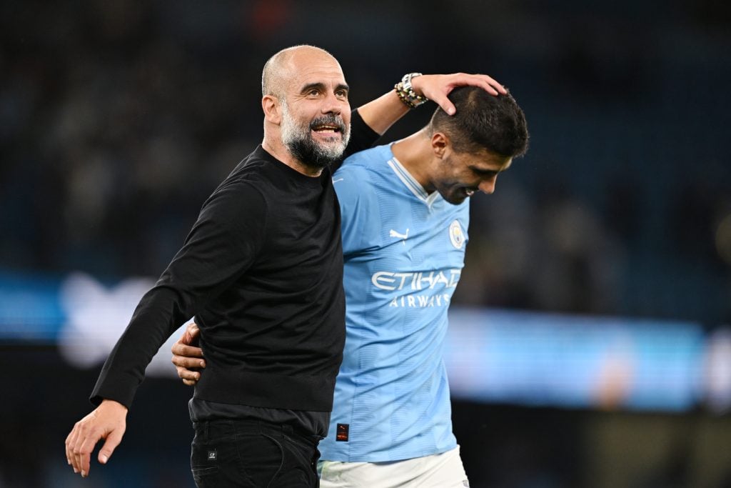 Pep Guardiola and Rodri of Manchester City