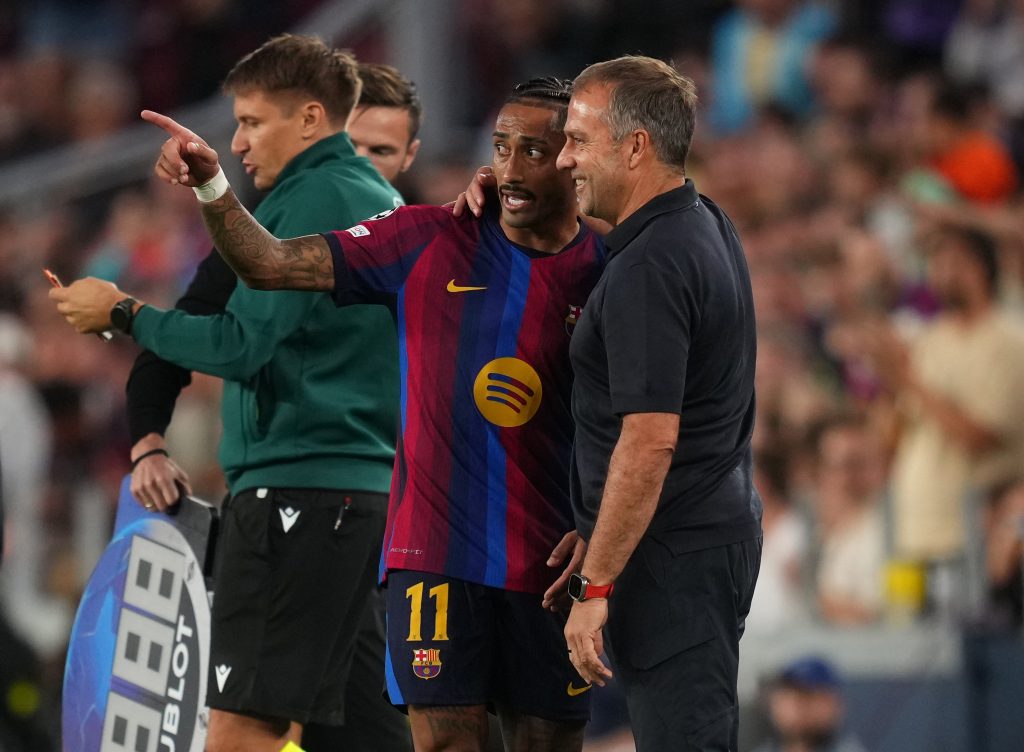 Raphinha and Hansi Flick of FC Barcelona