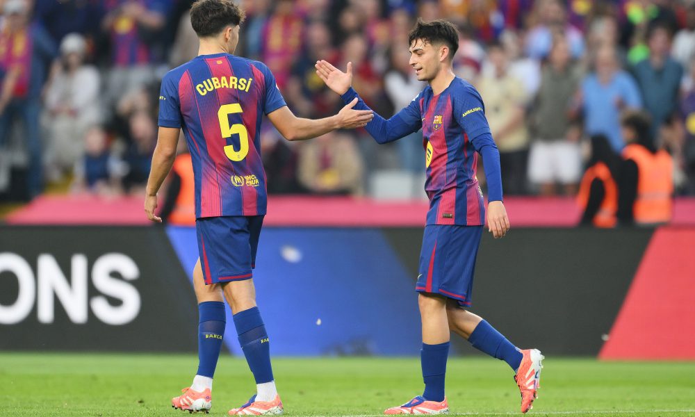 Pau Cubarsi and Pedri of FC Barcelona